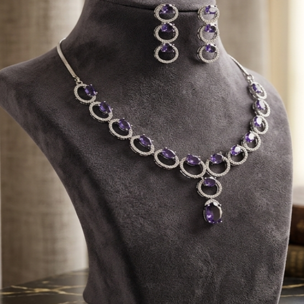 Necklace and earrings on a mannequin bust with a blurred background